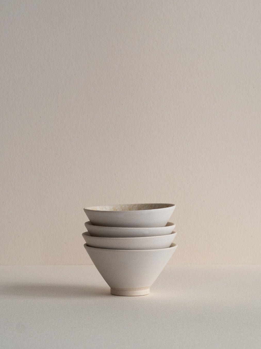 Conical glass ash glazes