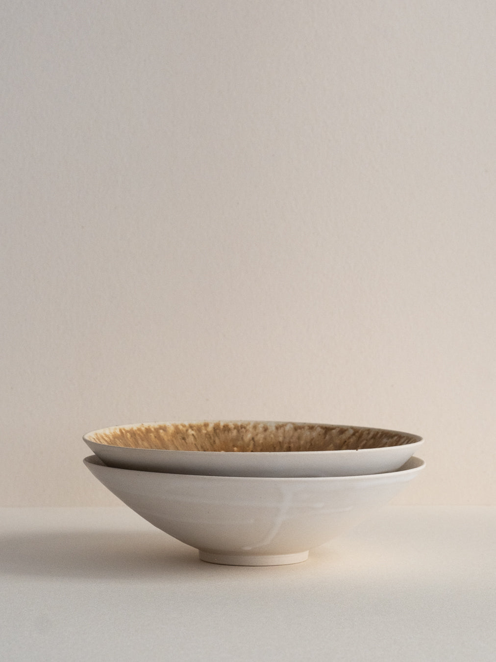 Conic bowl with ash glaze effects