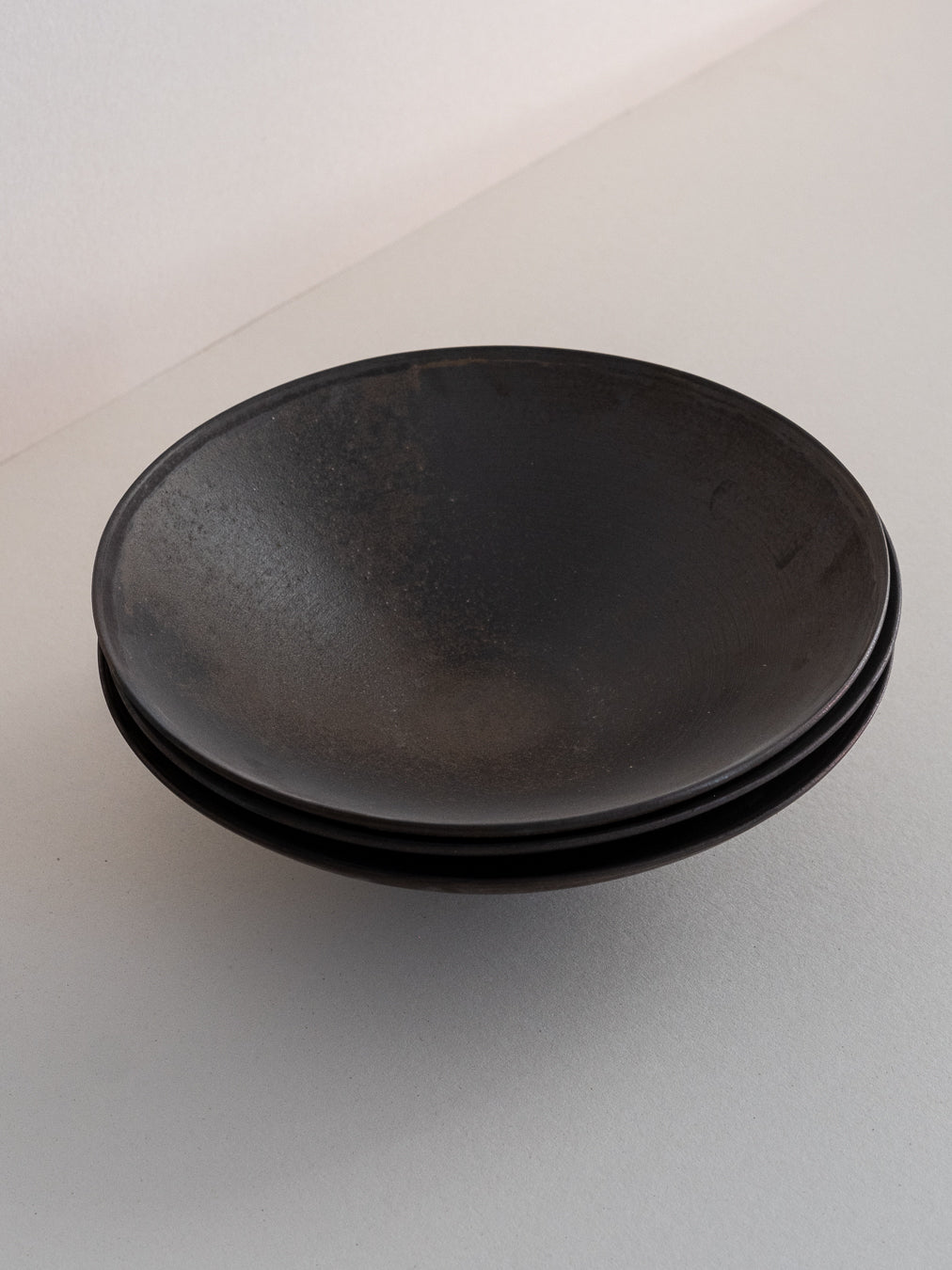 Grand conic bowl in black clay