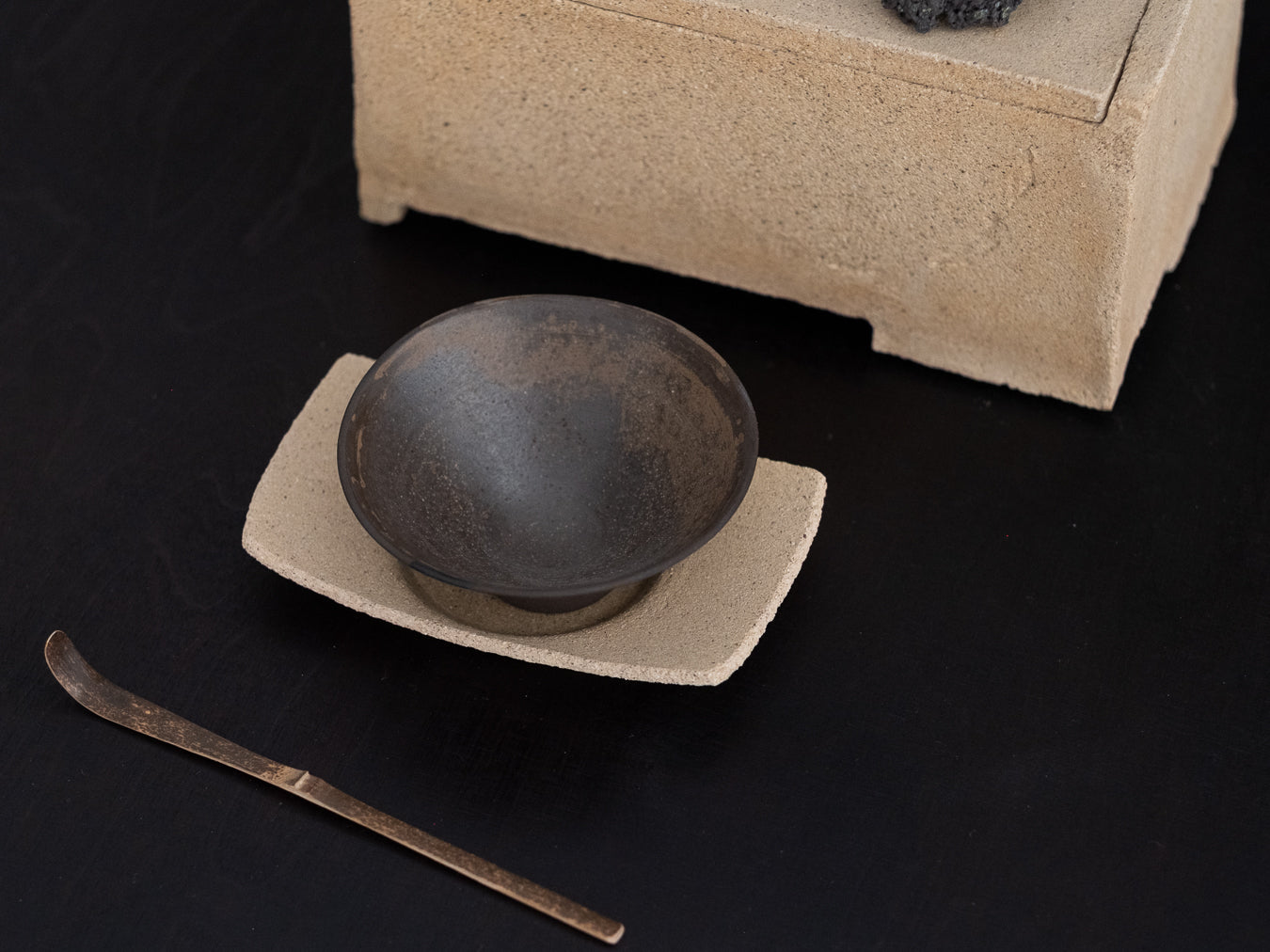 Conic glass finished with a pine ash glaze that creates natural