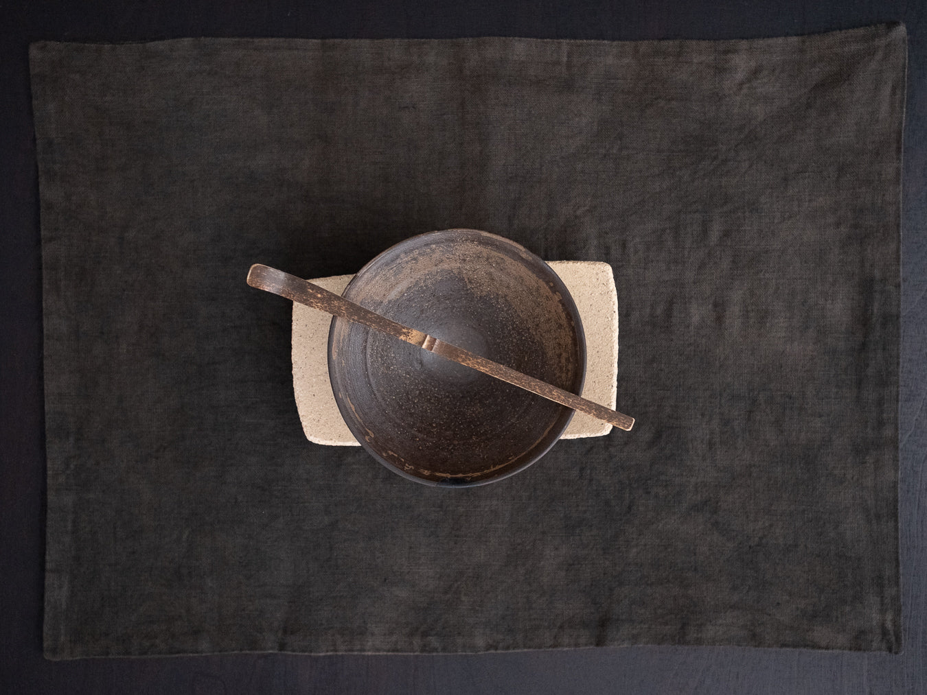 Conic glass finished with a pine ash glaze that creates natural